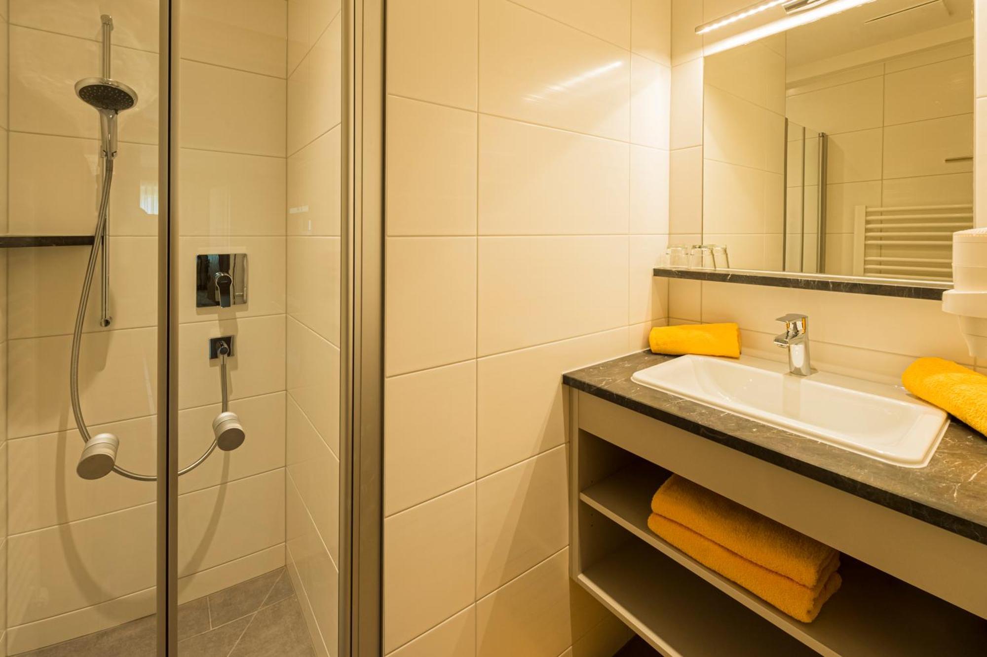 Apartments Tirolerhaus Kössen Стая снимка