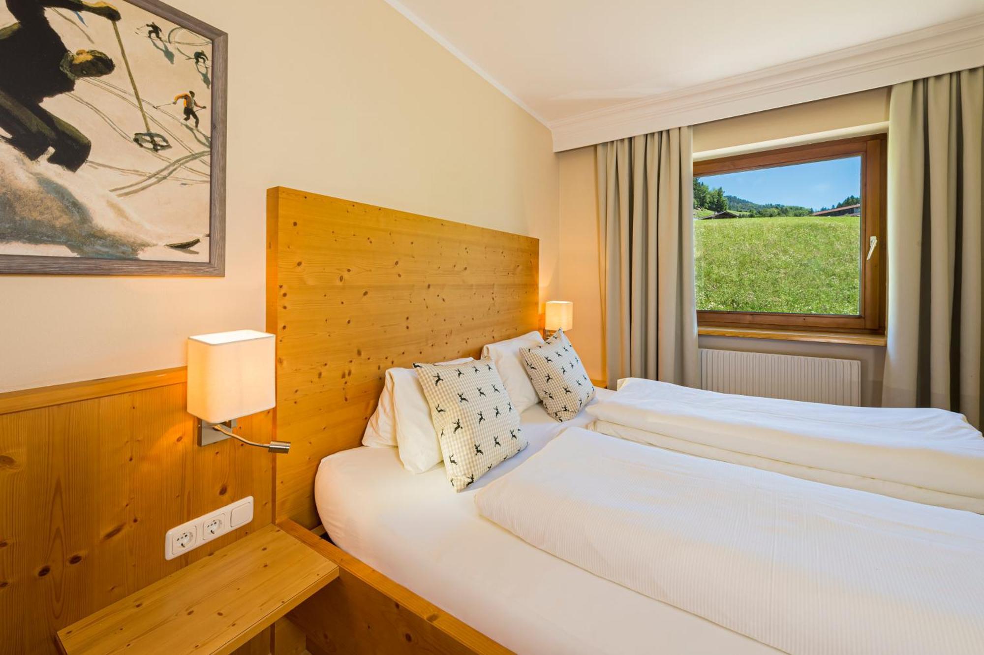 Apartments Tirolerhaus Kössen Стая снимка