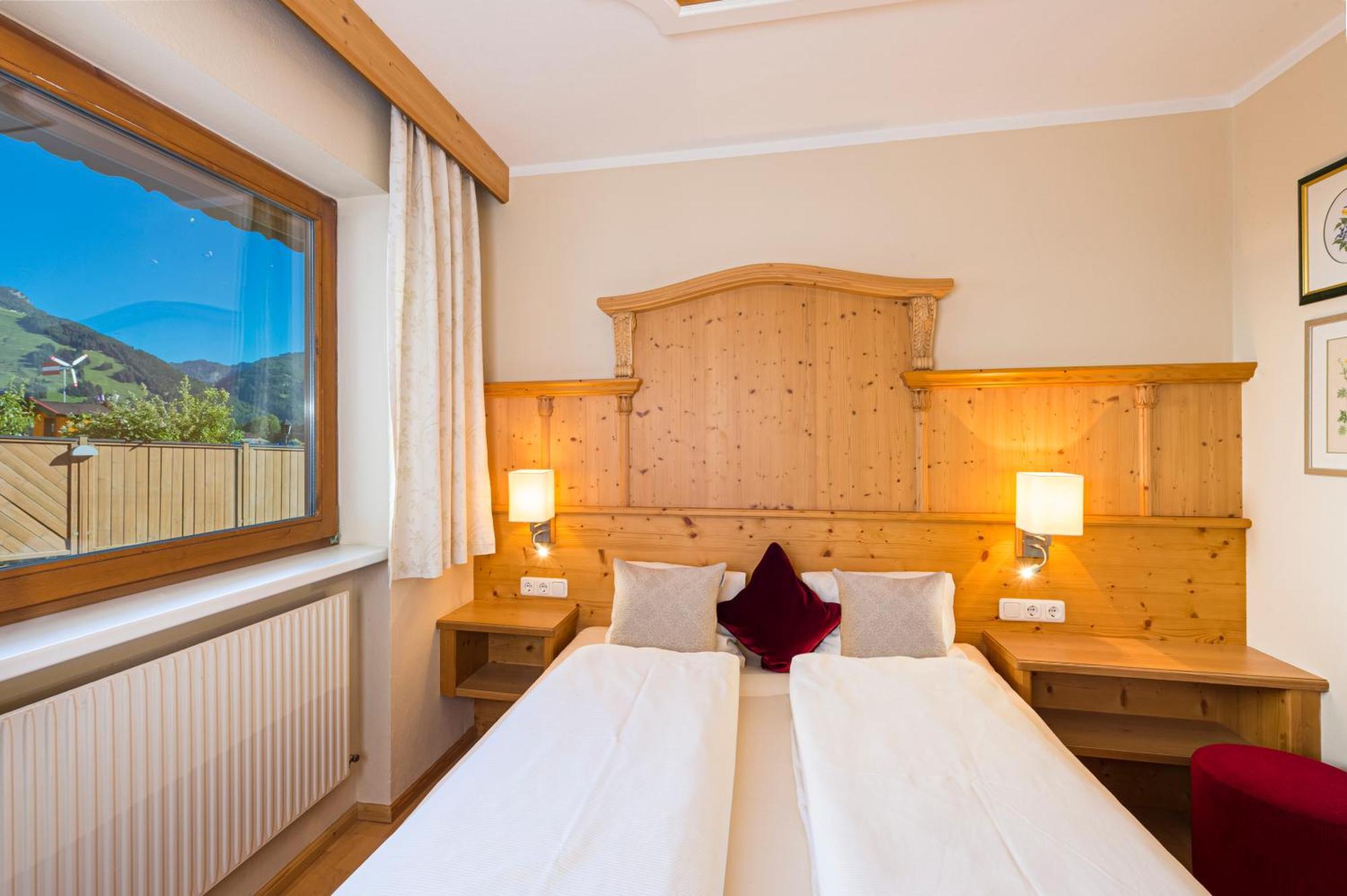 Apartments Tirolerhaus Kössen Стая снимка
