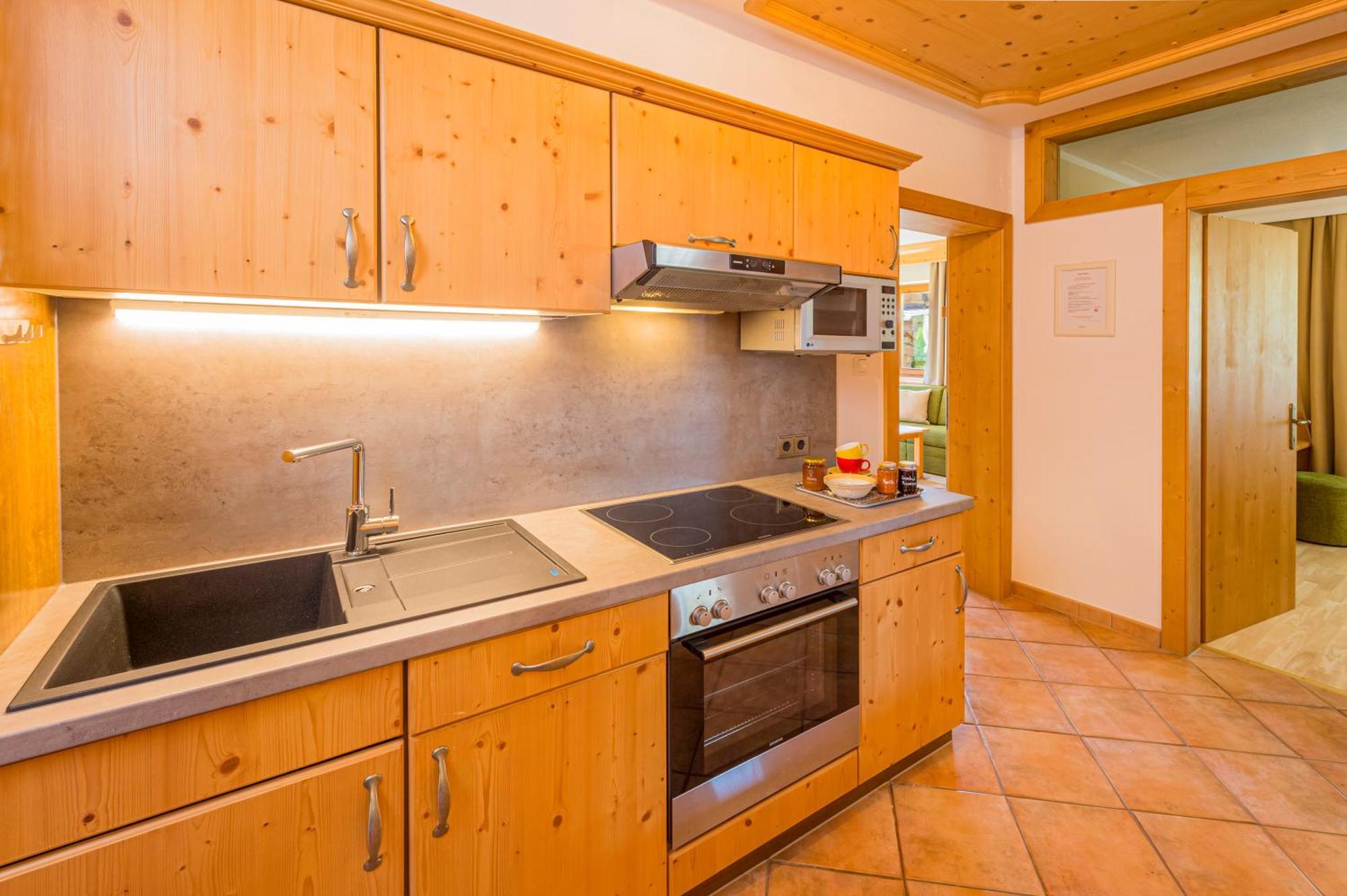 Apartments Tirolerhaus Kössen Стая снимка